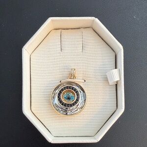 Elegant Gold and Blue Pendant
